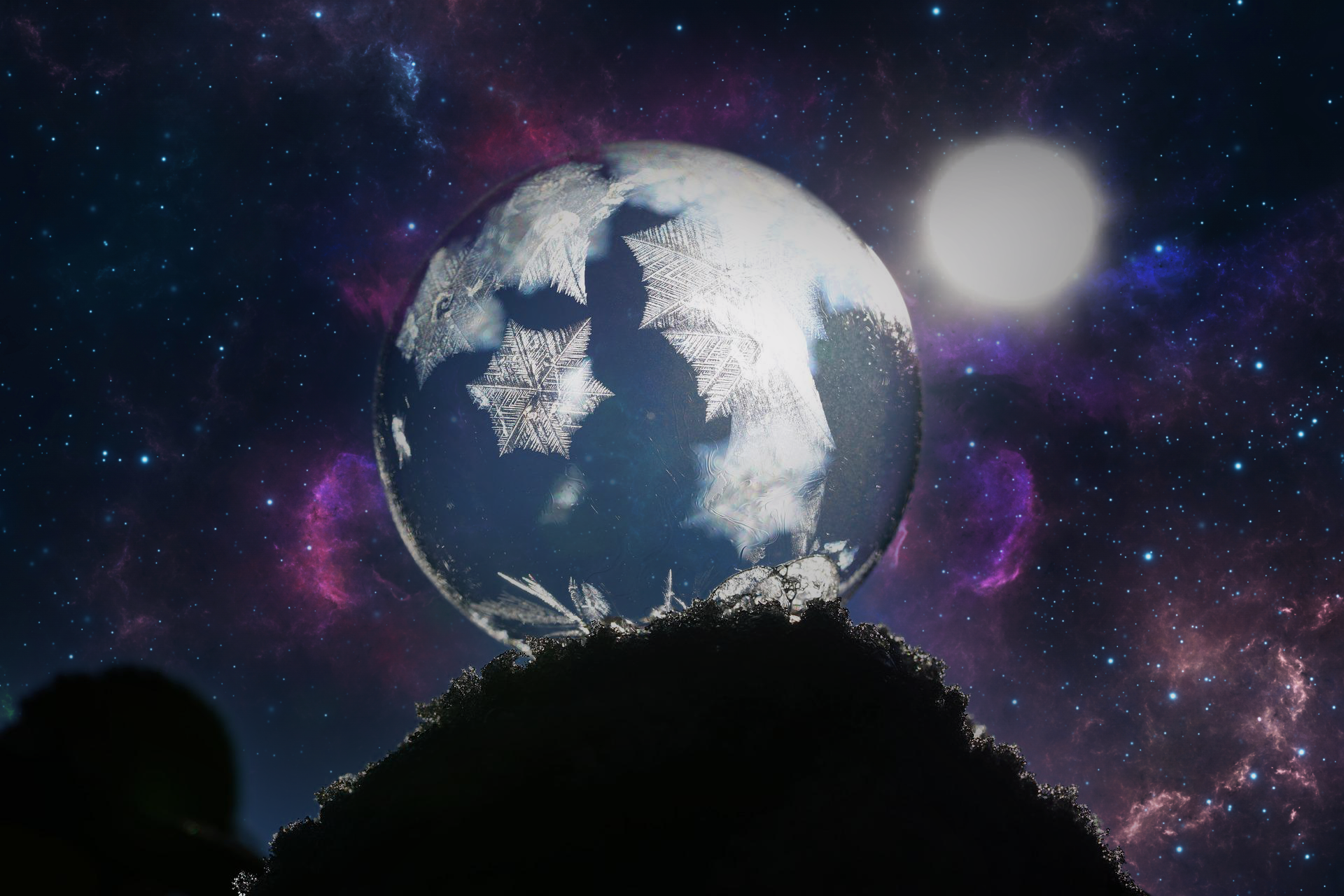 Growing bubble with snowflakes inside